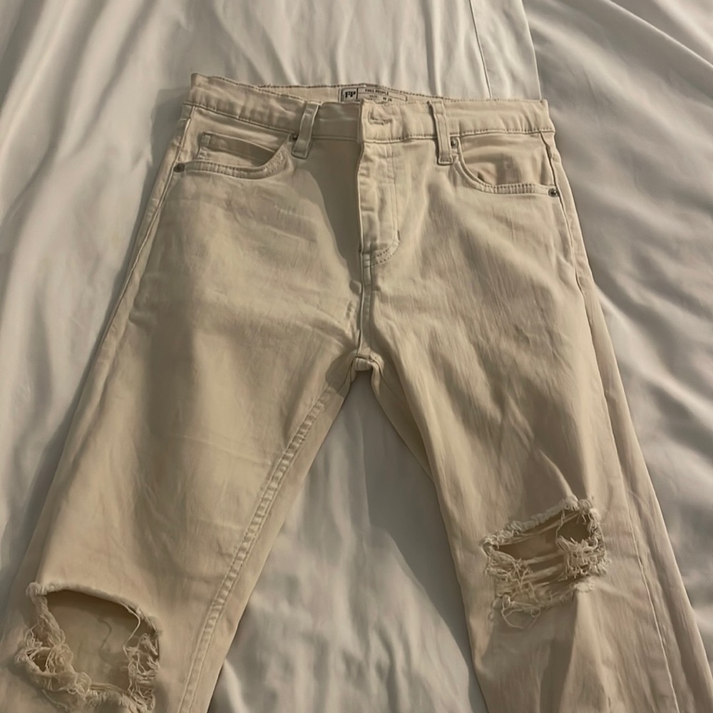 Free people cream ripped jeans